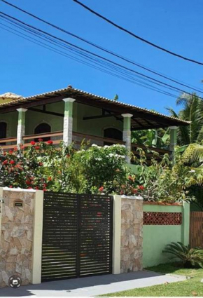 Pé na areia, água de coco, mar!